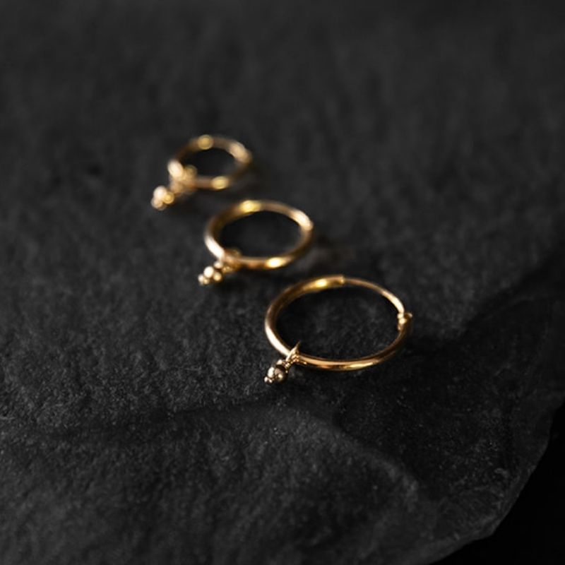 Starseed | Boucles d'oreilles créoles à breloques - Or - NOIR KĀLA